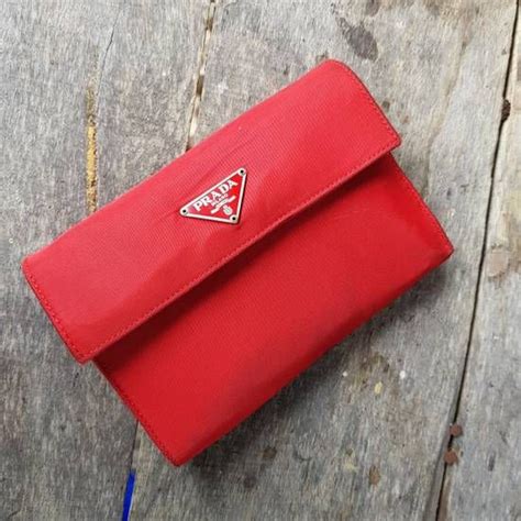 red prada wallet|prada trifold wallet.